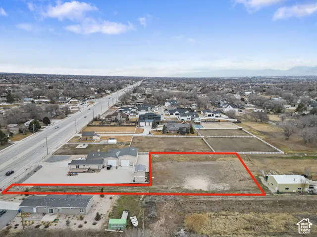 Expansive undeveloped land parcel with direct road frontage
