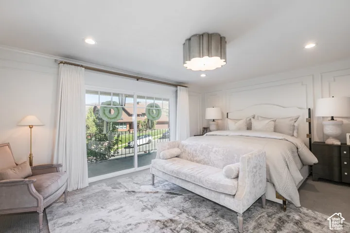 Panel molding accent wall, recessed lighting, and a decorative flush mount ceiling light