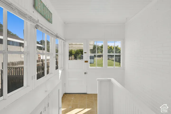 Bright interior space featuring multiple windows