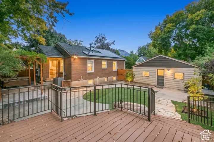 Wood-finish deck with metal railings