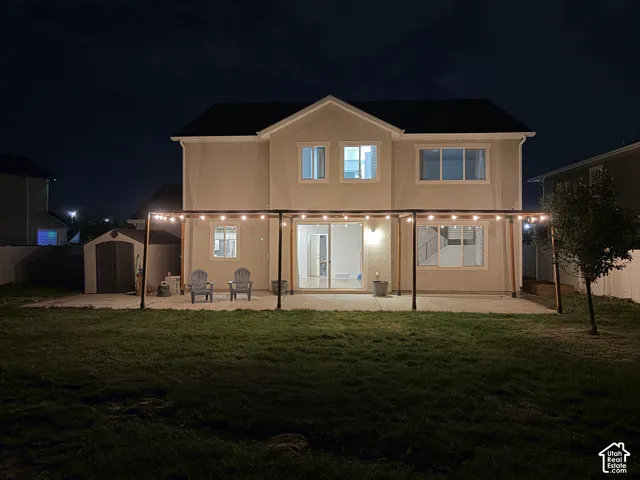 Expansive concrete patio with string lighting