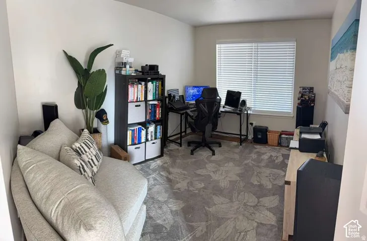 Recessed lighting, light-colored walls, carpeted flooring, and window blinds