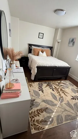 Recessed lighting fixture, wood-finish flooring, and light-toned wall paint