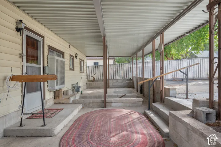 Covered patio with corrugated metal roofing