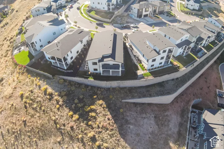 Modern residential architecture with dark shingle roofing