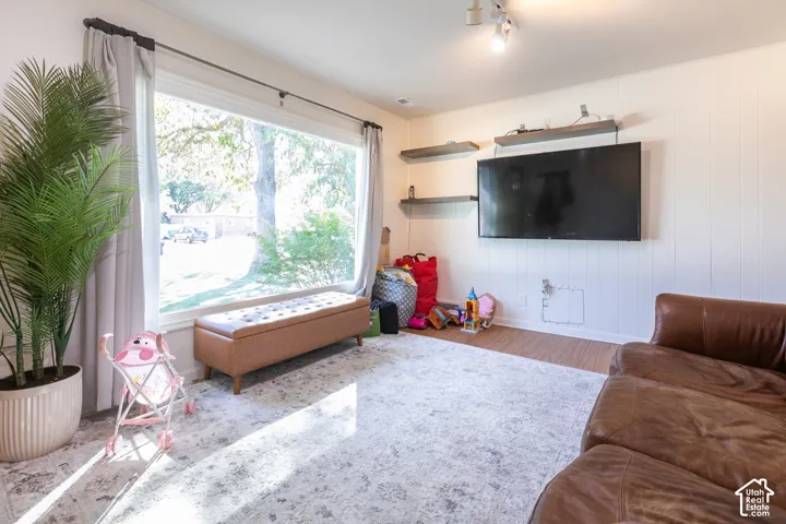 Main floor living room with large picture window facing the East
