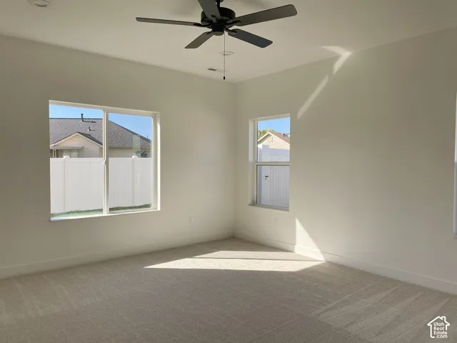 *COMPARABLE HOME, EXAMPLE OF LISTING AFTER COMPLETION. Carpeted flooring, multiple windows, recessed lighting, and a ceiling fan