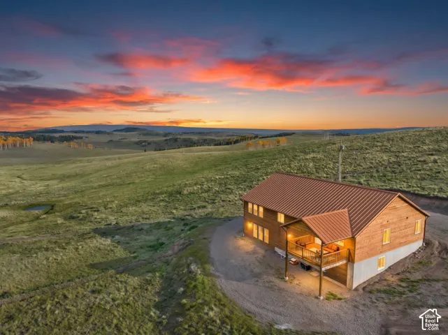 Exterior: Rolling meadows and distant mountains surround the property.