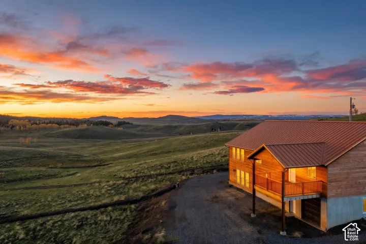 Exterior: Unobstructed views stretch across rolling meadows to distant mountains from this 2.25-acre setting.