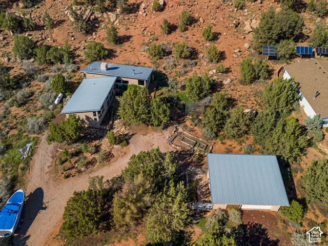 Multiple structures with metal roofs