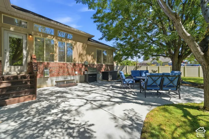Expansive concrete patio with direct home access