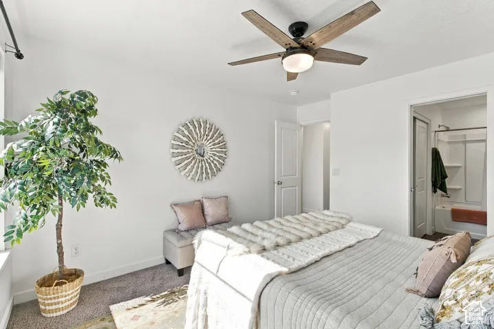 White walls with a wood-look ceiling fan and integrated lighting