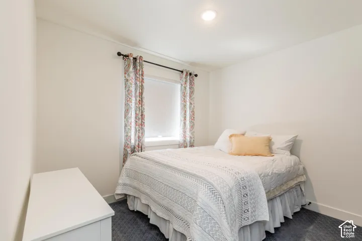 White painted walls with a recessed ceiling light