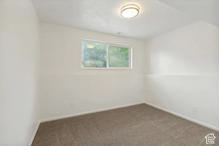 Neutral-toned carpeting throughout