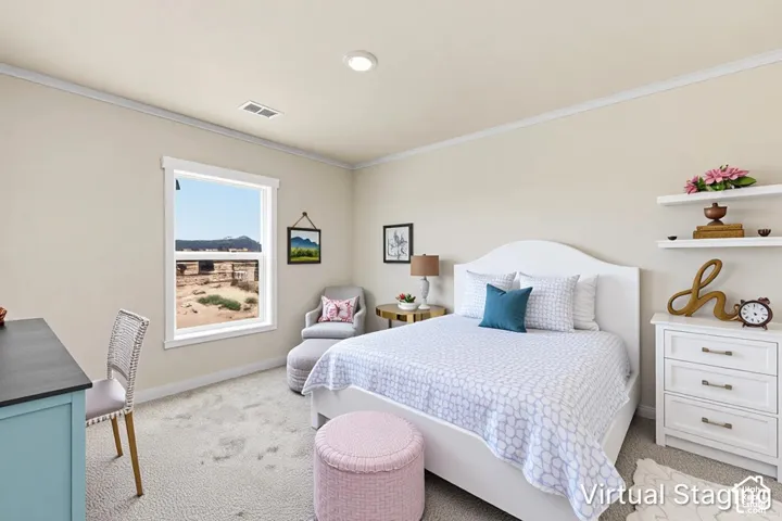 Bright room with neutral wall color, white crown molding, and recessed lighting