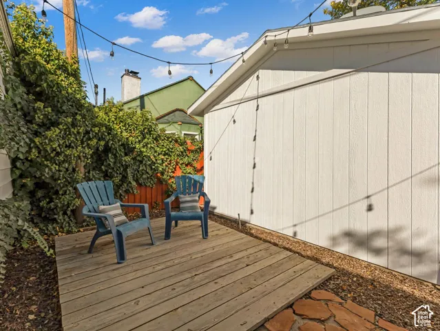 You will LOVE the beautiful, well-designed backyard! Two seating areas, flagstone patio with covered portico, and more! Also, see the oversized 1-car garage.