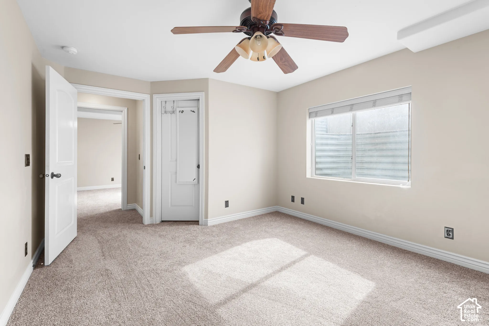 Recessed lighting, ceiling fan with light fixture, window with blinds, and neutral carpet