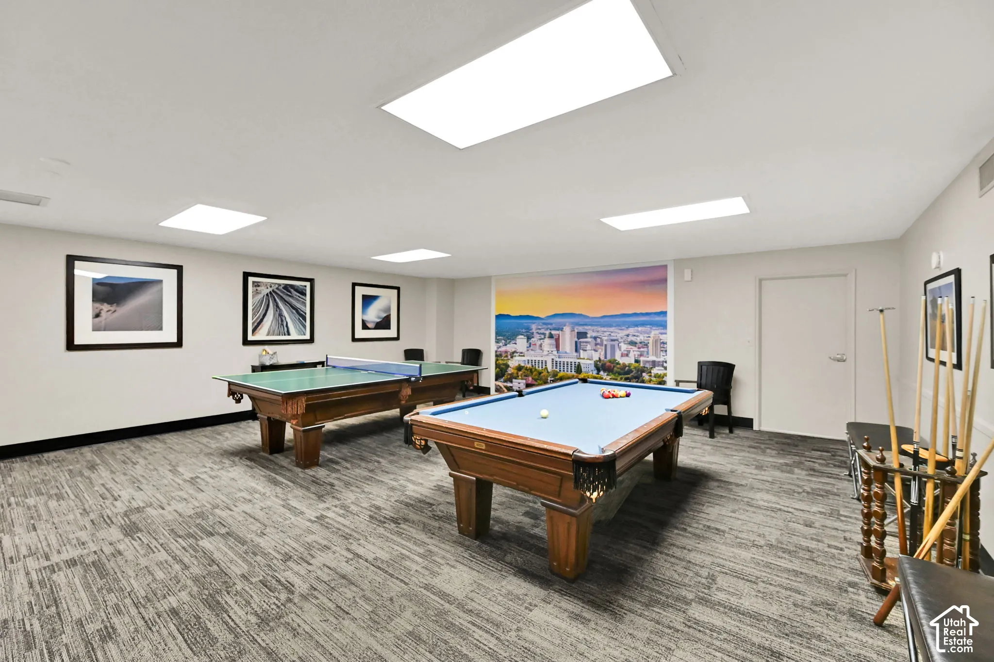 Recreational area featuring a pool table, ping pong table, and patterned carpet flooring