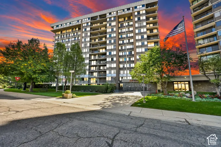 High-rise structure featuring multiple balconies and a prominent entrance