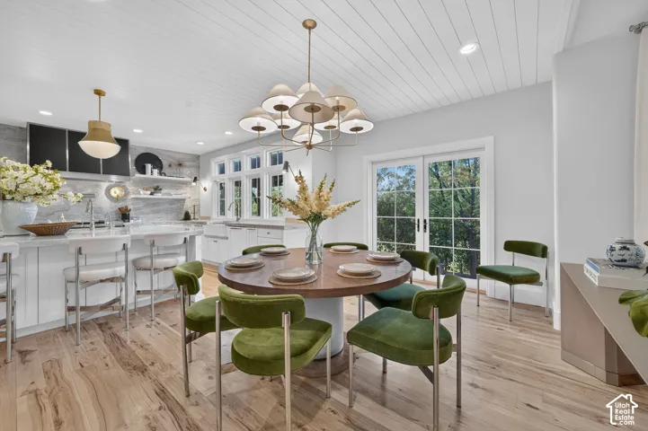 Wood-finish flooring throughout, complemented by a shiplap ceiling