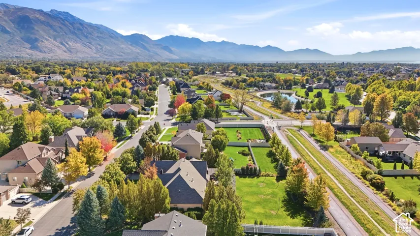 Residential area featuring tree-lined streets, established homes, and green spaces
