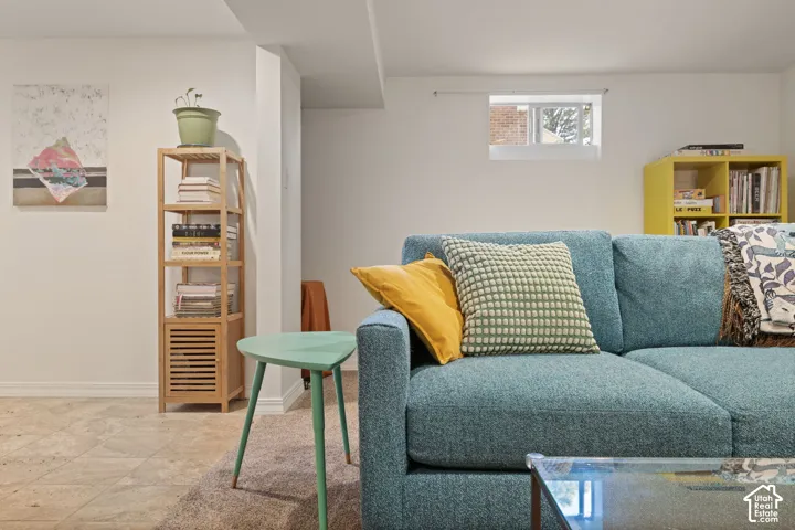 Recessed window, wood-finish shelving, and tiled flooring