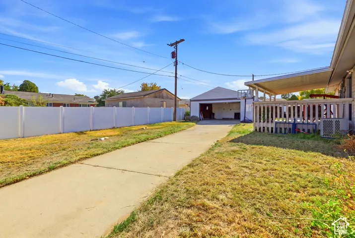 Attached garage with an open bay