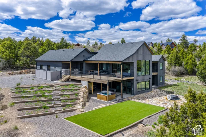 Modern architectural style with dark vertical siding