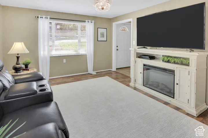 Warm-toned walls with a single window featuring white blinds