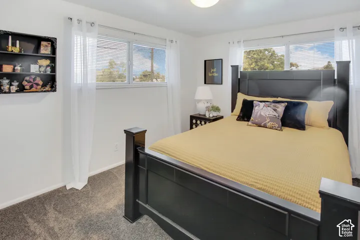 #2 Bedroom Recessed ceiling light, two windows with blinds, carpet flooring