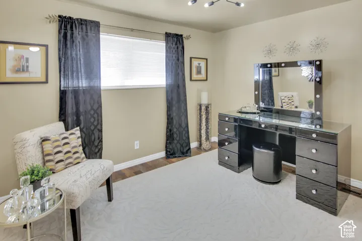 #2 Bedroom Wood-finish flooring and large window