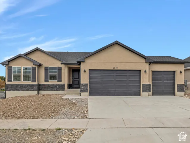 Stucco exterior with stone accent detailing