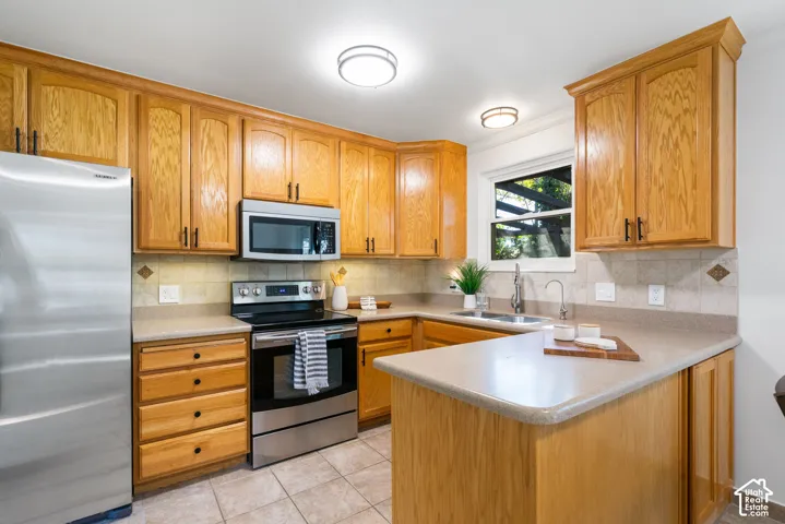 Solid wood cabinetry, stainless steel appliances, solid surface countertops.