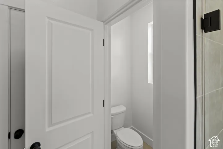 White paneled interior door with matte black hardware