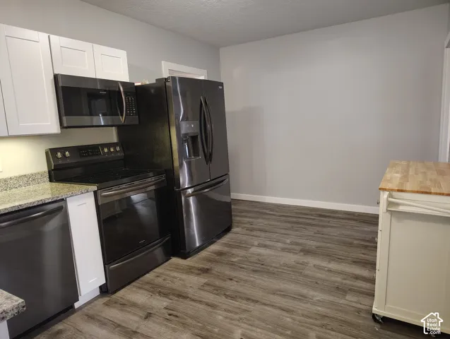 Fridge, range, microwave and dishwasher included. Dishwasher is less than 1 year old.