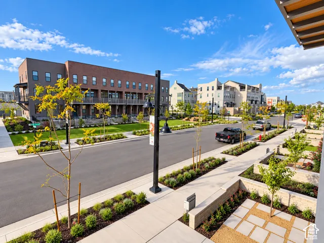 Townhome community featuring modern architecture and extensive landscaping