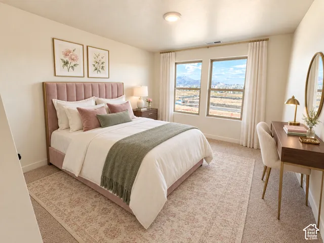Carpeted flooring, recessed lighting, and dual windows
