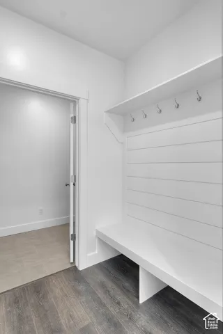 Built-in bench with upper shelf and coat hooks