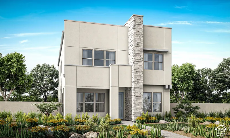Modern architectural exterior featuring a prominent stone facade accent and multiple window placements