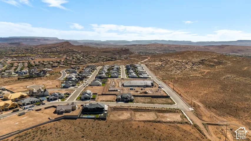 Expansive desert landscape with established residential areas and undeveloped land