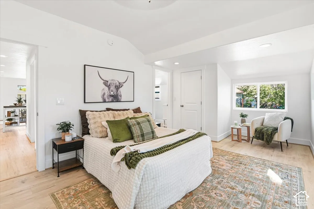 The primary bedroom is on the main floor. It is large and has a sitting area and an ensuite.