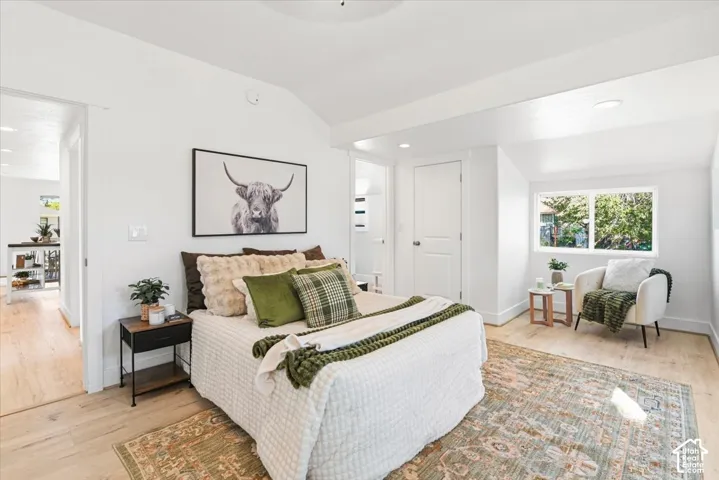 The primary bedroom is on the main floor. It is large and has a sitting area and an ensuite.
