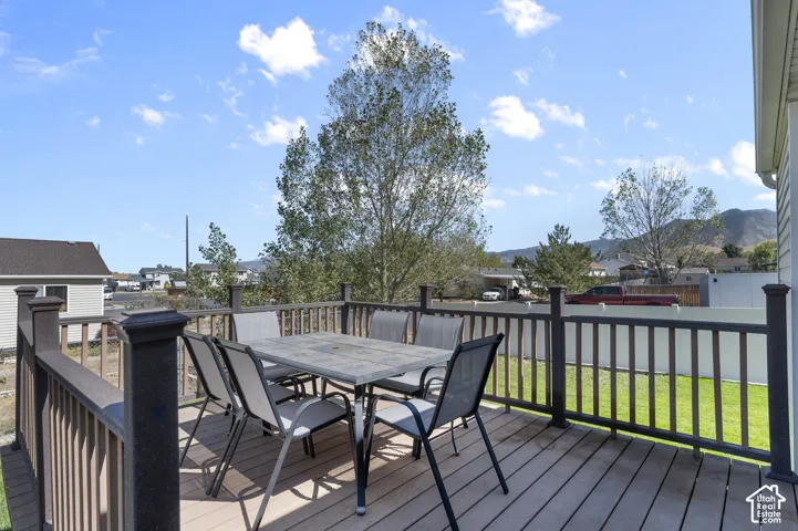 Spacious outdoor deck with composite decking and dark railing