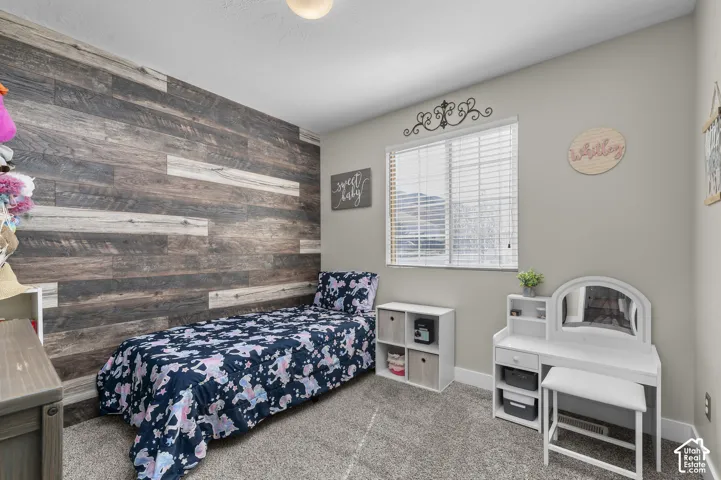 Accent wall featuring wood-finish paneling