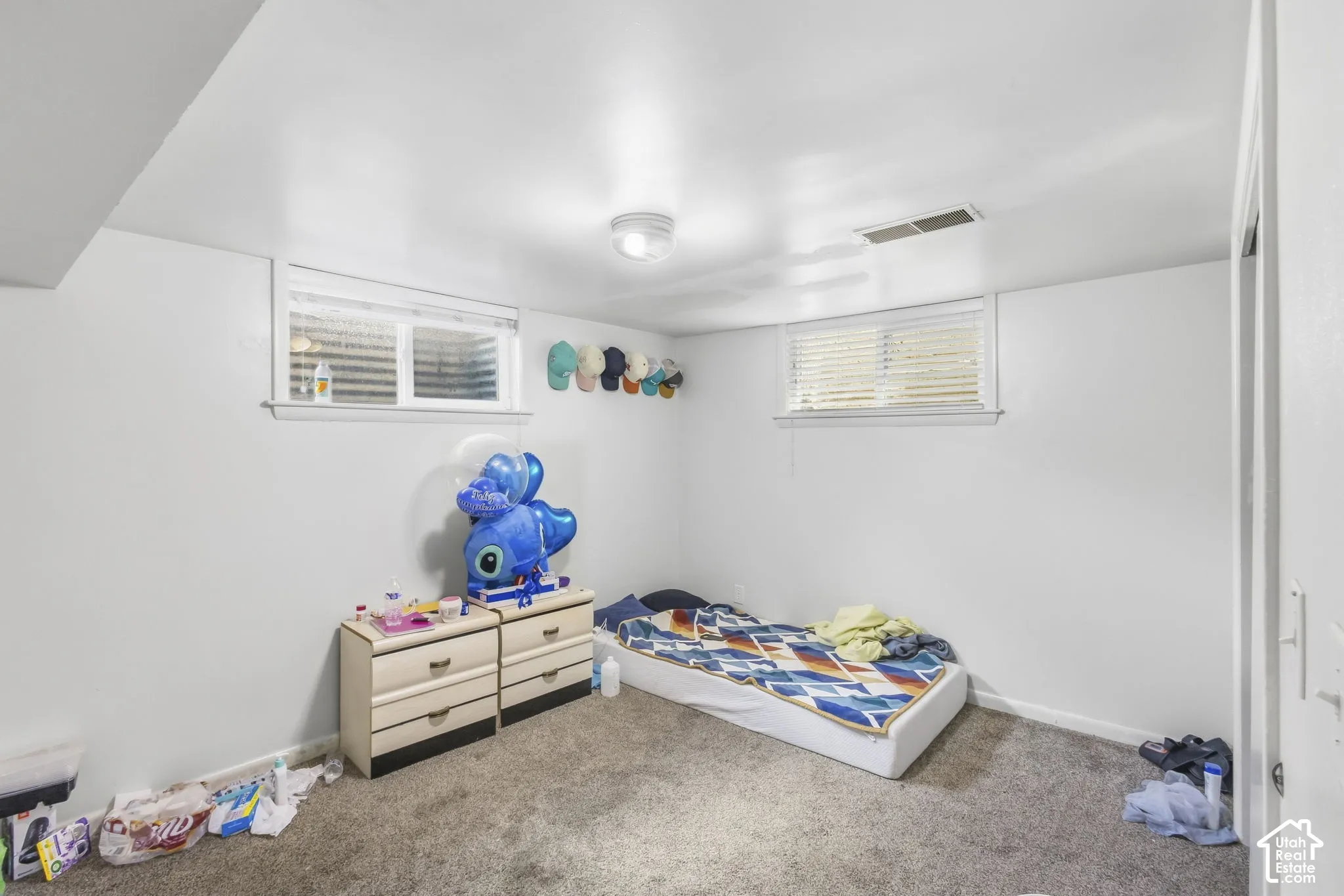 Room 5 located in basement, carpet flooring