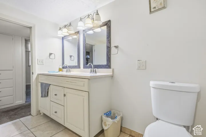 Dual vanity in basement's bathroom.