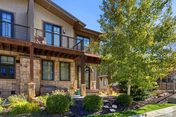 Stone veneer and horizontal siding exterior