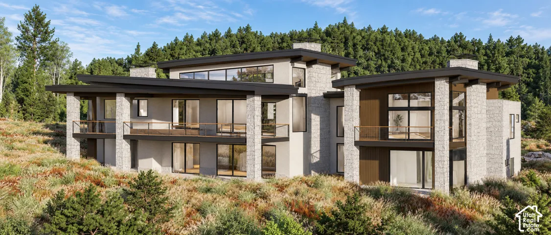Multi-level contemporary exterior featuring stone and wood-paneled accents, flat roofline, multiple balconies, and extensive window placements