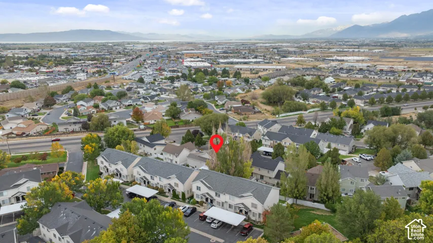 Aerial perspective of a developed residential area with multiple townhome structures