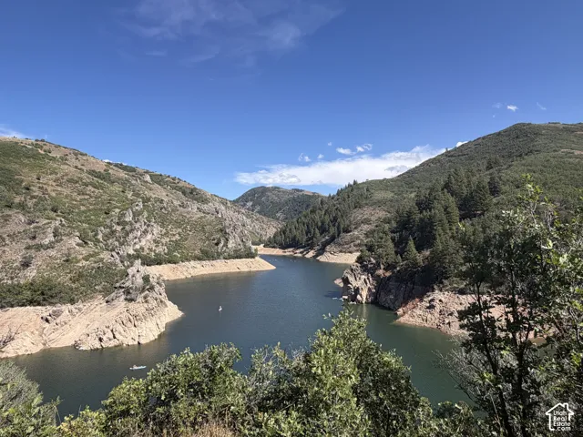Expansive water body surrounded by mountainous terrain